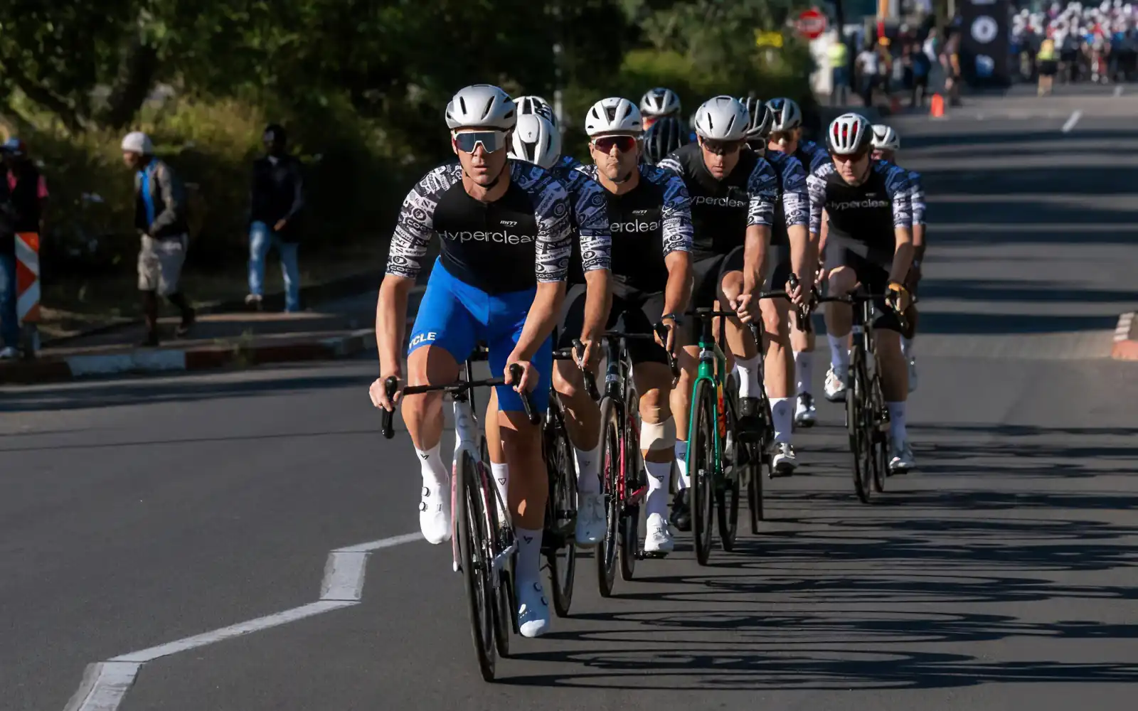 Hyperclear Road Cycling Team athletes riding in a high-speed paceline during the Coronation Double Century to fund Raise for a Child initiatives.